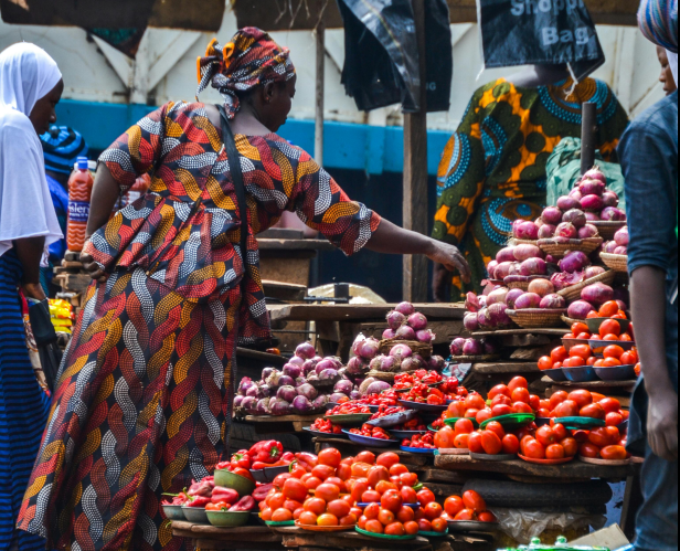 African woman with scarf, smiling